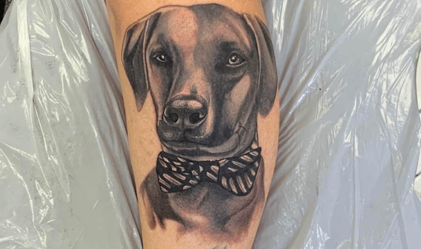 Black Rose and Dagger Tattoo